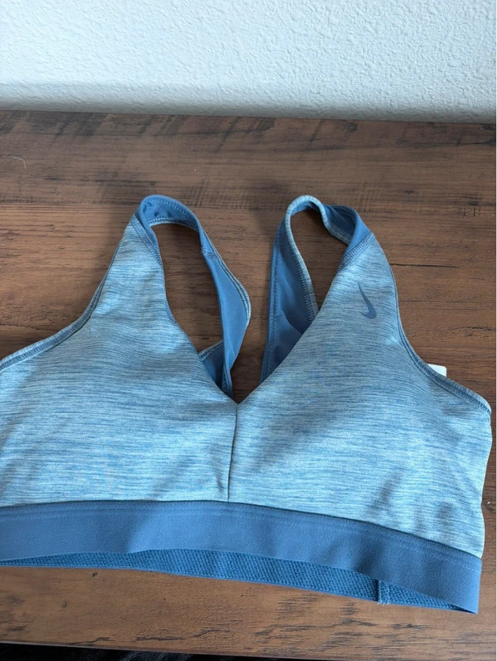 Nike blue twist back sports bra size M. Removable pads